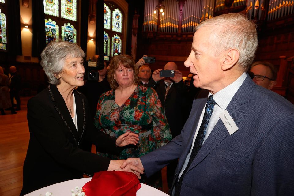 President Catherine Connolly shakes hands with Democratic Unionist Party MP for East Londonderry Gregory Campbell during a civic reception at the Guildhall, Derry, on day two of her visit to Northern Ireland. Photo: PA